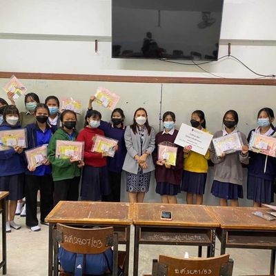 The students and teachers are showing the self-learning kits for the camera.