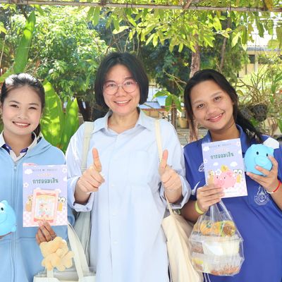 The students and PND staff are happily smiling for the camera.