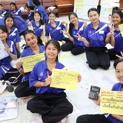 Group of students are smiling at the camera.