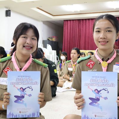 The students are presenting a book.