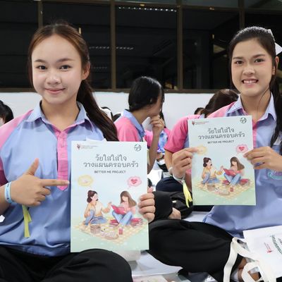 The students are presenting the workshop booklet.