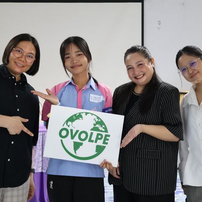 The student and PND staffs are happily smiling for the camera.
