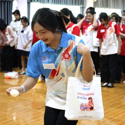 A student is smiling while attending the workshop.