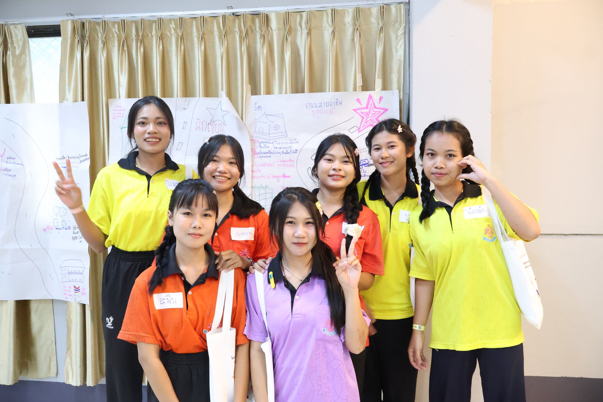 Group of students are smiling at the camera