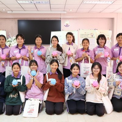 Students are happily smiling for the camera.