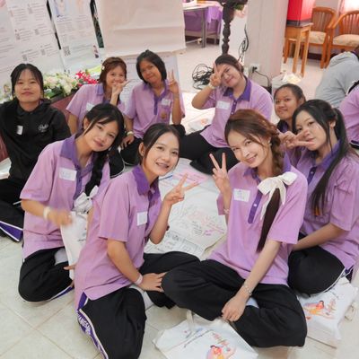Students are happily smiling for the camera.